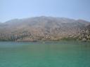 010. In all of its beauty - The water in Lake Kournas has many varieties of color in the form of astonishing turquoise, lavender and blue stripes.