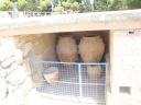 065. Giants storage jars, or pithoi, at Knossos - (Κνωσσός). Storehouse of pithoi is approximately 4000 years old. In ancient Greek Pithos (pl.Pithoi), or Πίθος, Πίθοι, is a large earthenware storage jar