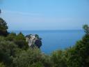 20. Gorgeous rock - View of Aghios Ioannis church (Άγιος Ιωάννης) from a mountain nearby