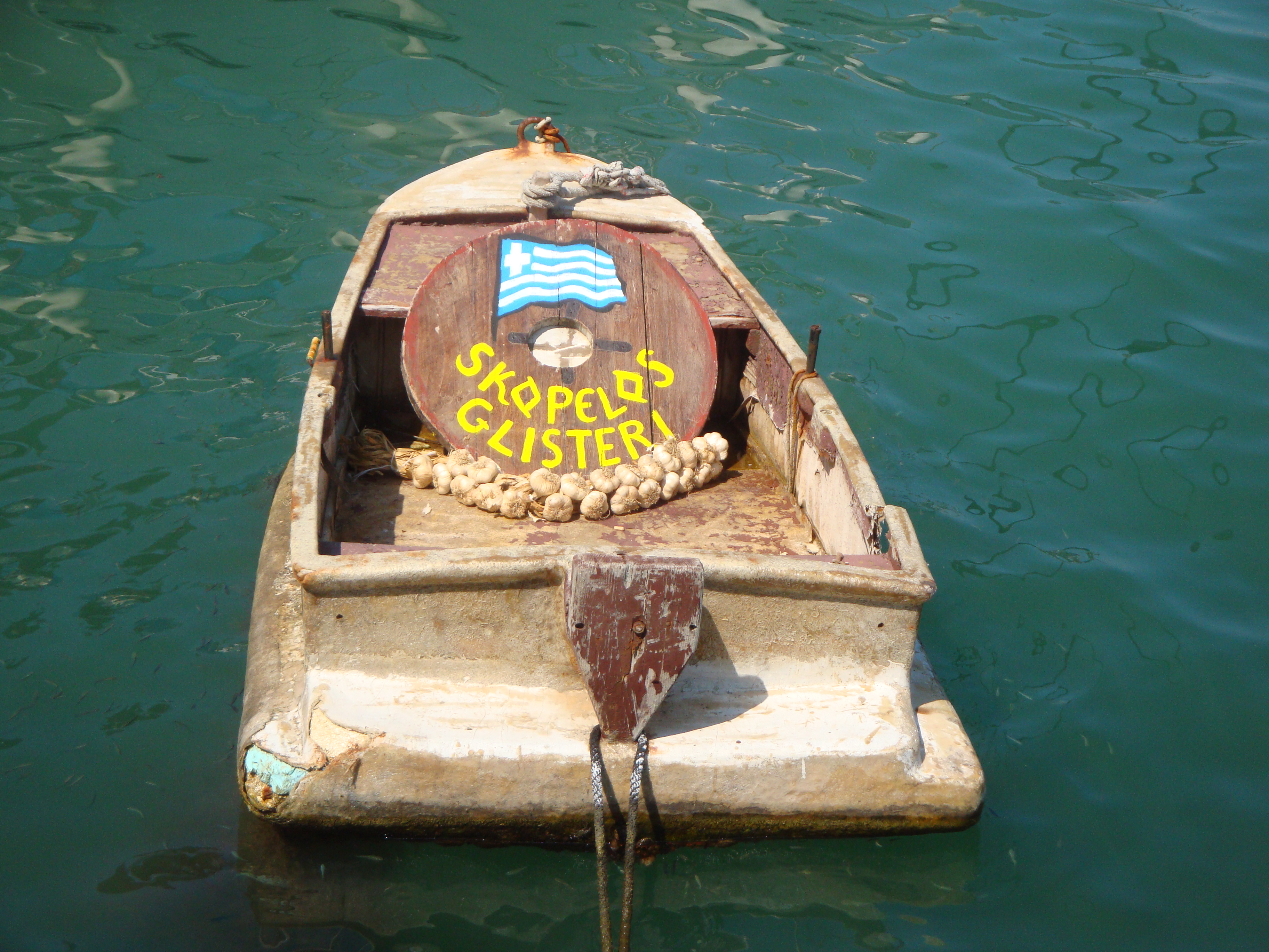 The old-fashioned boat to Glysteri beach (Γλυστέρι)