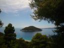 004. View of green Dhasia Island (Δασειά) - And Milia beach (Μηλιά)