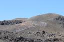 07. Line of tourists crawling along the bald mountain - Such an extraterrestrial scenery! Nea Kameni island, Santorini