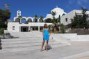 34. At the entrance to the museum of Firá (Φηρά) - There is a main cathedral of Firá in the background. Santorini