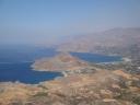 089. Top view of Damnoni and Plakias beaches - Damnoni beach (η παραλία Δαμνόνι) is on the left and Plakias beach (η παραλία Πλακιάς, Ρέθυμνο) is on the right. Timios Stavros Church (Τίμιος Σταυρός). Skinaria village (Σκινάρια, Ρέθυμνο), South Crete.